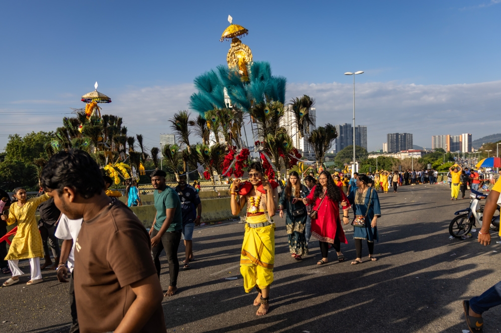 Devotees bearing kavadi make their way to Batu Caves temple during Thaipusam, February 1, 2026. — Picture by Firdaus Latif