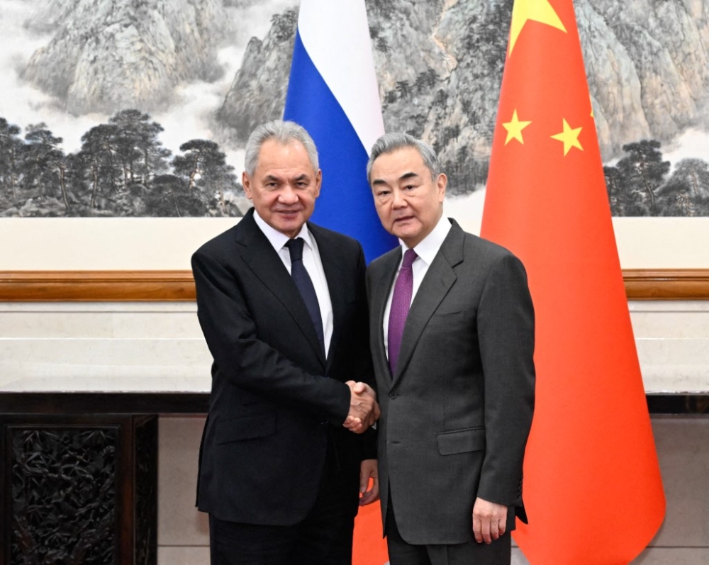 Moscow signals ‘unwavering’ backing for Beijing on Taiwan in talks with Wang Yi