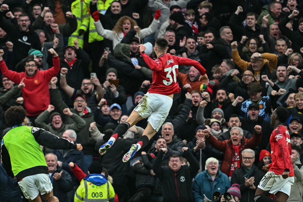 Manchester United’s Benjamin Sesko celebrates his team’s third goal just before the end of time during the Premier League match with Fulham at Old Trafford in Manchester February 1, 2026. — AFP pic
