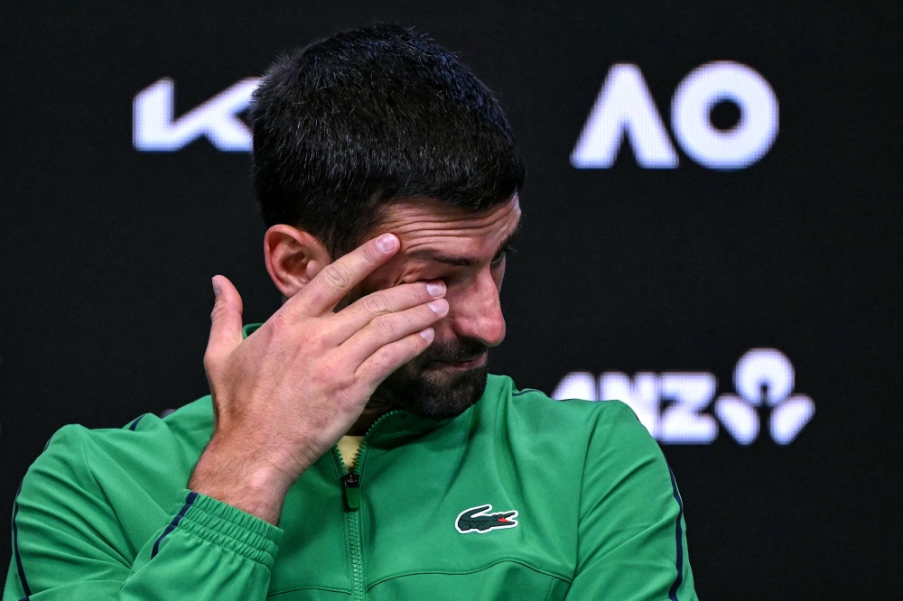 Serbia’s Novak Djokovic gestures during a press conference after his defeat against Spain’s Carlos Alcaraz in their men’s singles final match on day fifteen of the Australian Open in Melbourne February 1, 2026. — AFP pic