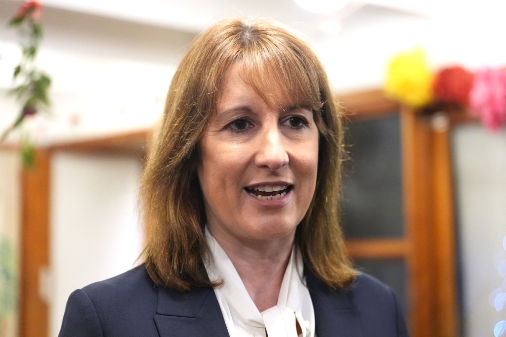 British Finance Minister Rachel Reeves aims to reduce administrative costs across Whitehall by 16 per cent. — AFP pic