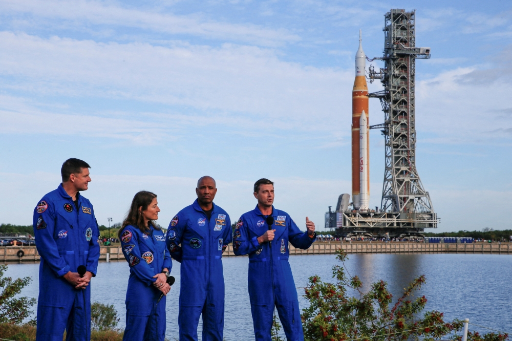 ‘Artemis 2’ mission’s Commander Reid Wiseman speaks next to pilot Victor Glover, mission specialists Christina Koch and Jeremy Hansen during the rollout of Nasa’s next-generation moon rocket — the Space Launch System (SLS) rocket with the Orion crew capsule — to the launch pad at the Kennedy Space Centre in Cape Canaveral, Florida, January 17, 2026. — Reuters pic