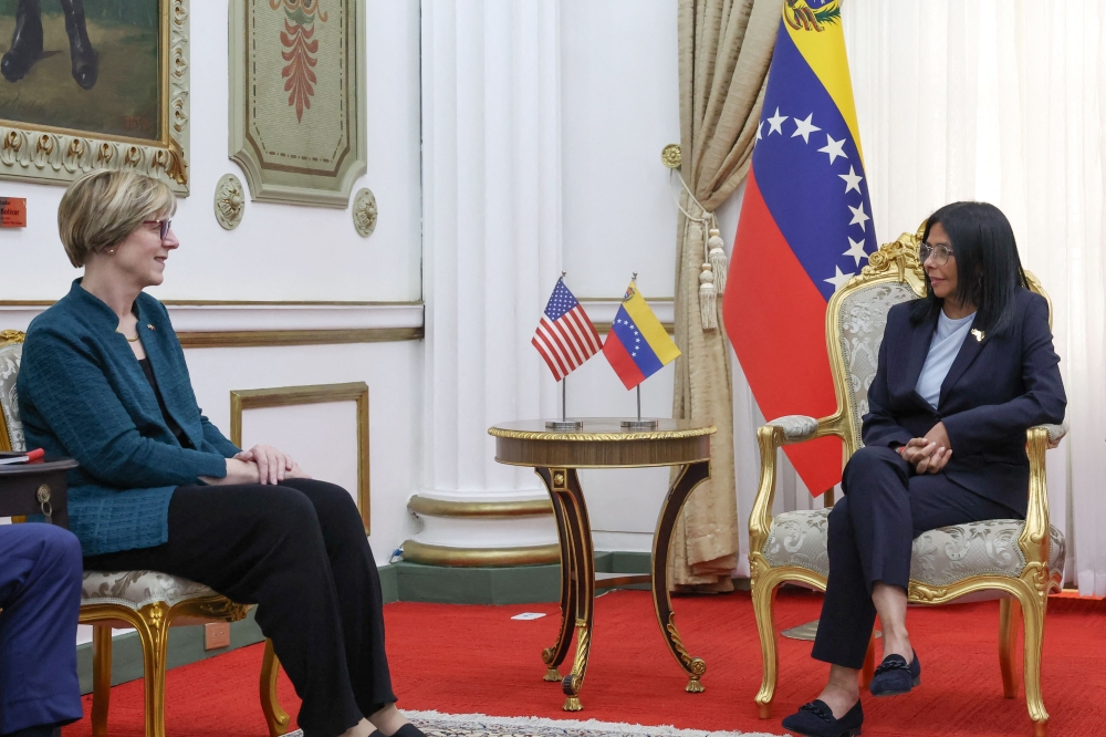 Venezuela’s interim President Delcy Rodriguez speaks with the new head of the United States diplomatic mission for Venezuela Laura Dogu during a meeting at the Miraflores Presidential Palace in Caracas on February 2, 2026. — AFP pic
