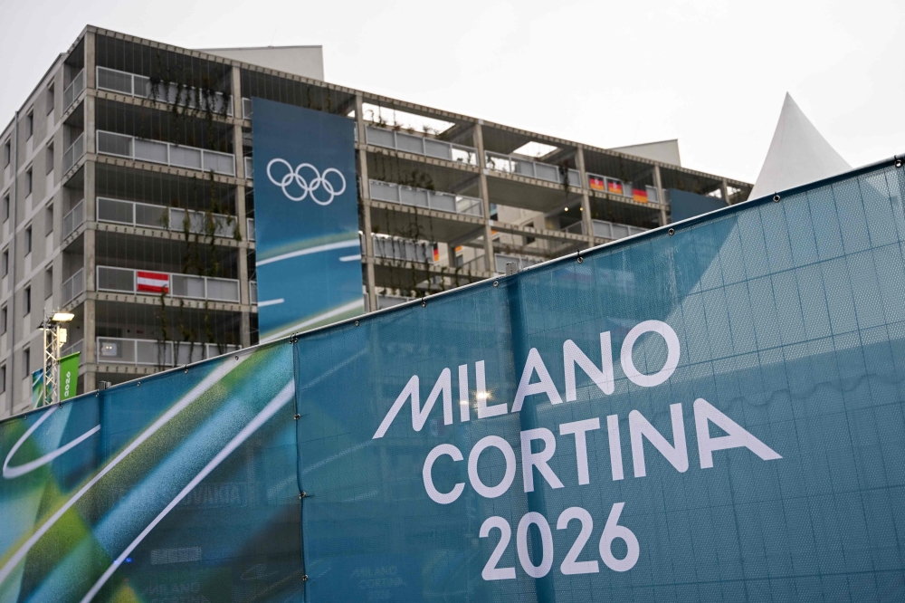 Olympic rings hang on an exterior of the Olympic Village ahead of the Milano Cortina 2026 Winter Olympics in Milan on February 3, 2026. The issue of transgender athletes at the Olympics and other top sports events has become a controversial issue in recent years due to the lack of clear and universal rules governing sport. — AFP pic 