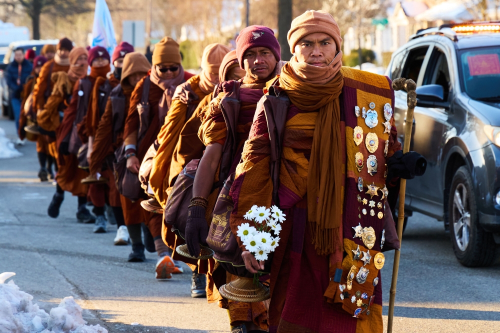 Buddhist monks walking for peace strike chord in divided US as they near Washington