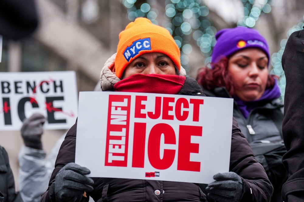 People take part in a rally to stop ICE enforcement at the Super Bowl, outside of NFL Headquarters in New York February 3, 2026. — Reuters pic 