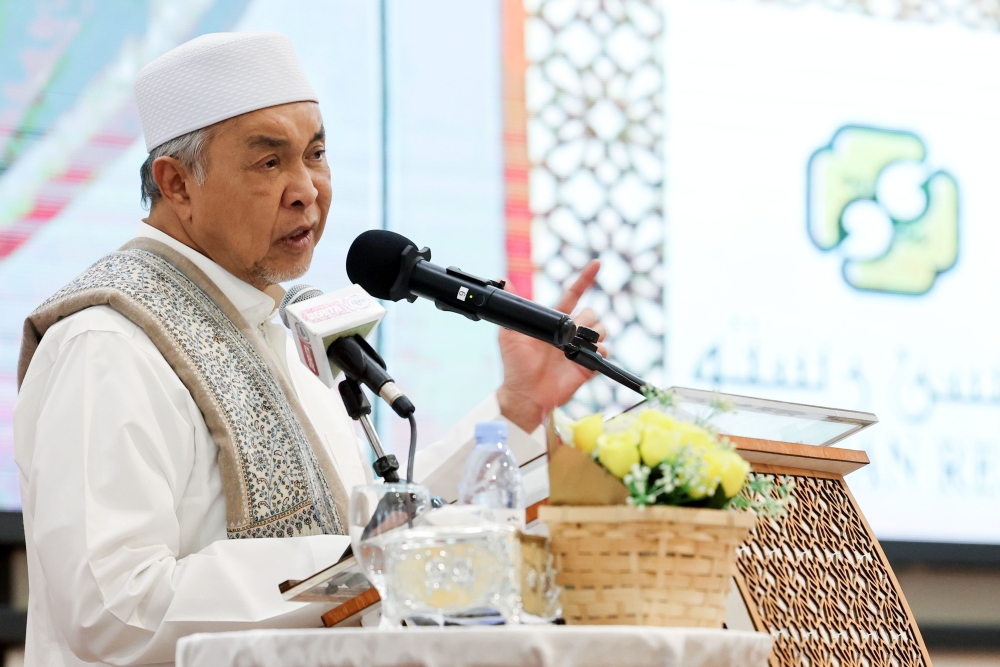 Deputy Prime Minister Datuk Seri Dr Ahmad Zahid Hamidi speaks at the opening of the 19th National Waqaf Al-Quran Programme at Dewan Abdullah Bukhari, Kompleks Nasyrul Quran, Putrajaya, February 3, 2026. — Bernama pic