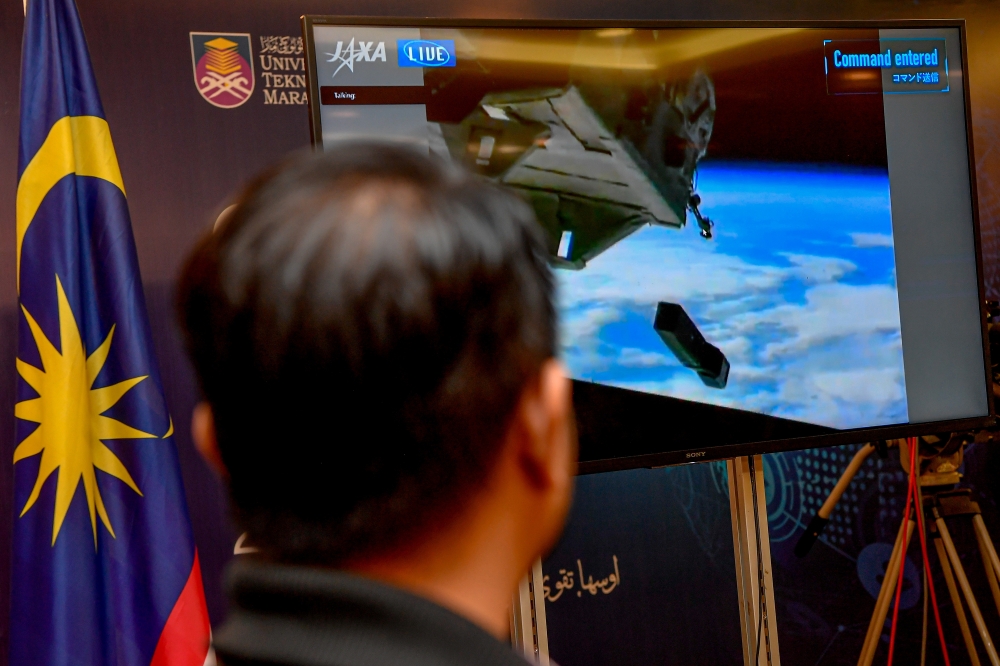 UiTM makes history as its second nanosatellite, UiTMSAT-2, is successfully deployed into orbit from the International Space Station (ISS) yesterday. — Bernama pic