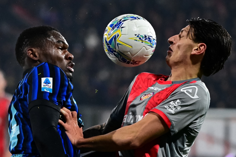 Inter Milan’s French forward #14 Ange-Yoan Bonny (left) fights for the ball with Cremonese’s Italian defender #22 Romano Floriani Mussolini during the Italian Serie A football match between US Cremonese and Inter Milan at the Giovanni Zini Stadium in Cremona, northern Italy, on February 1, 2026. — AFP pic
