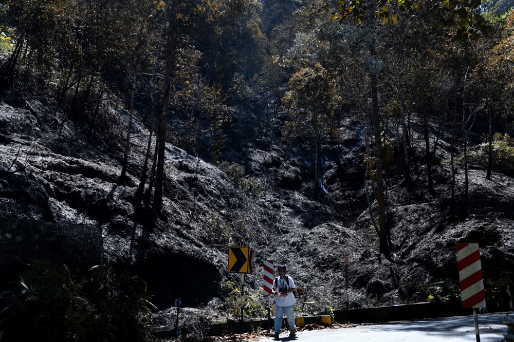 Firefighters will continue monitoring the area using drones and regular patrols due to hot, dry conditions and its status as a fire hotspot and major tourist attraction. — Bernama pic