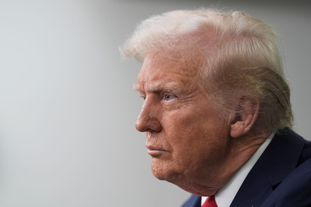 Trump posts conspiracy video depicting Obamas as monkeys, drawing backlash from Democrats