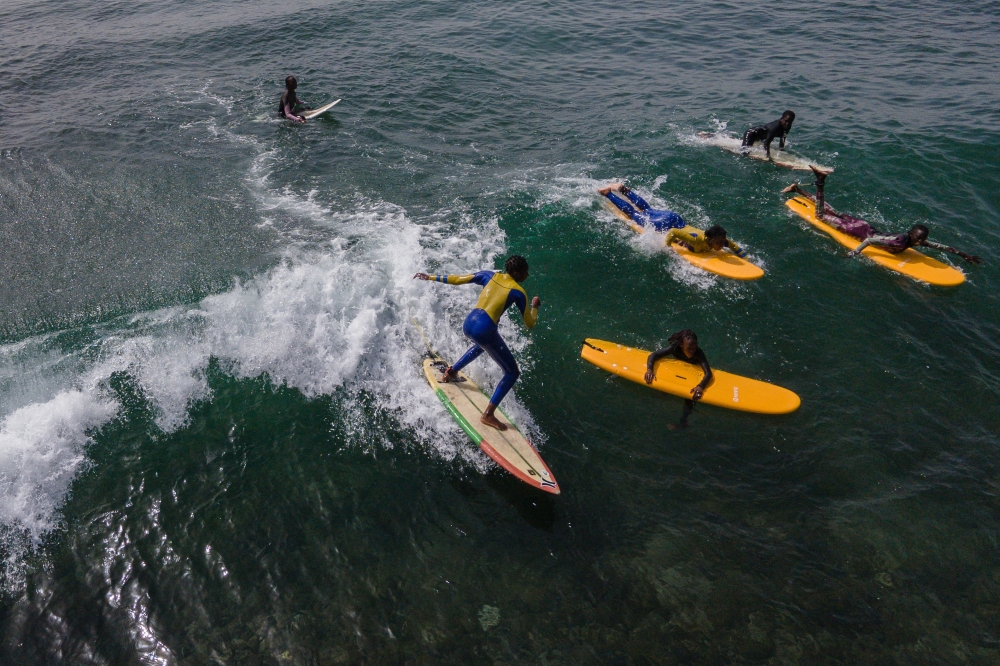Catching waves, catching knowledge: Senegalese girls swap coastline for classrooms