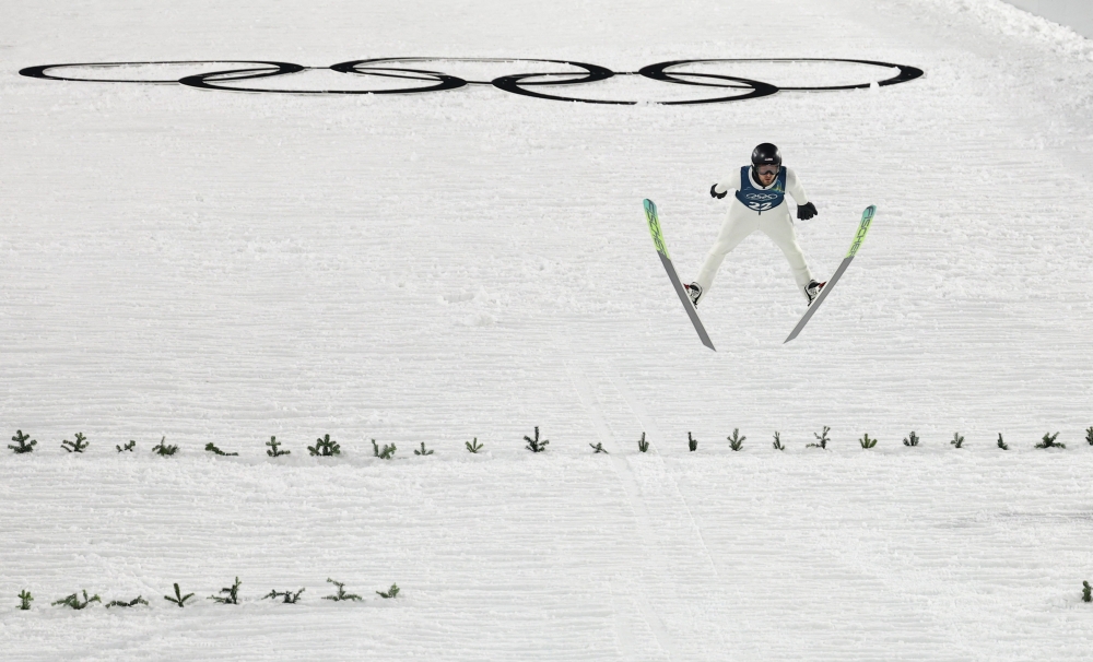 Ski jumpers undergo full-body scans to ensure their skin-tight suits contain no excess material that could increase lift, as regulations tightly limit how far the suit may extend in the lower body. — Reuters pic