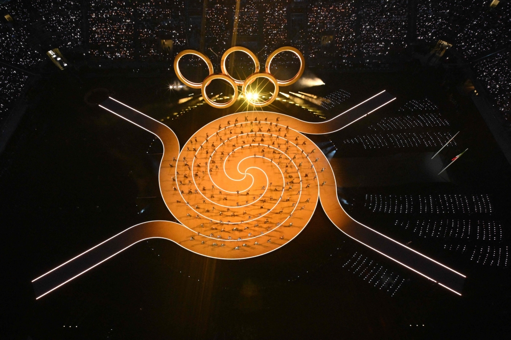 TOPSHOT - Rings form the Olympic emblem during the opening ceremony of the Milano Cortina 2026 Winter Olympic Games at the San Siro stadium in Milan, northern Italy, on February 6, 2026. — AFP pic