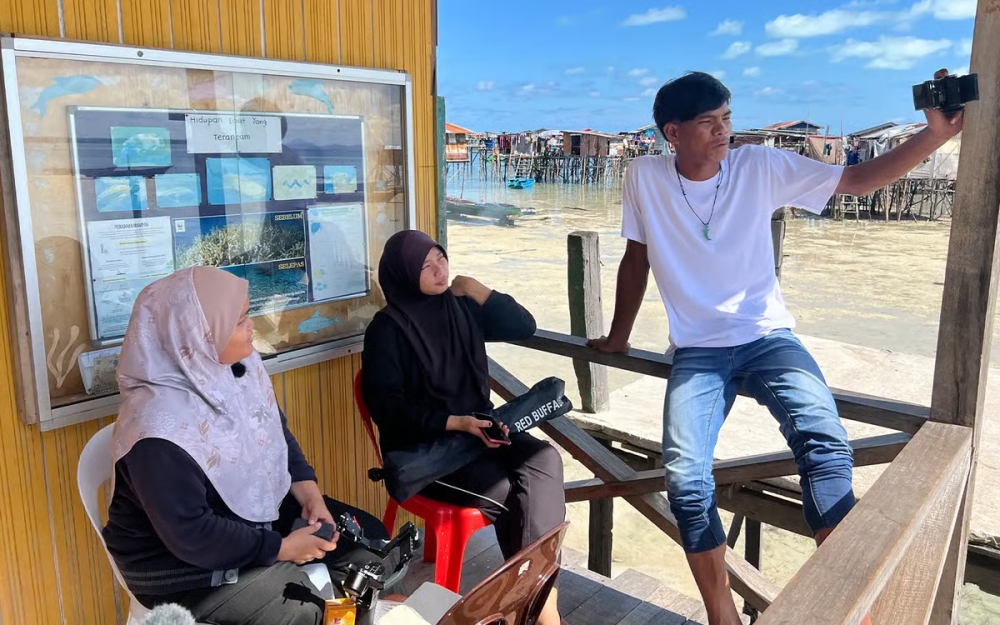The documentary is co-directed by the youths it features, ‘junior directors’ Shima (left), Didi (centre) and Bilkuin. — Picture courtesy of Fat Bidin
