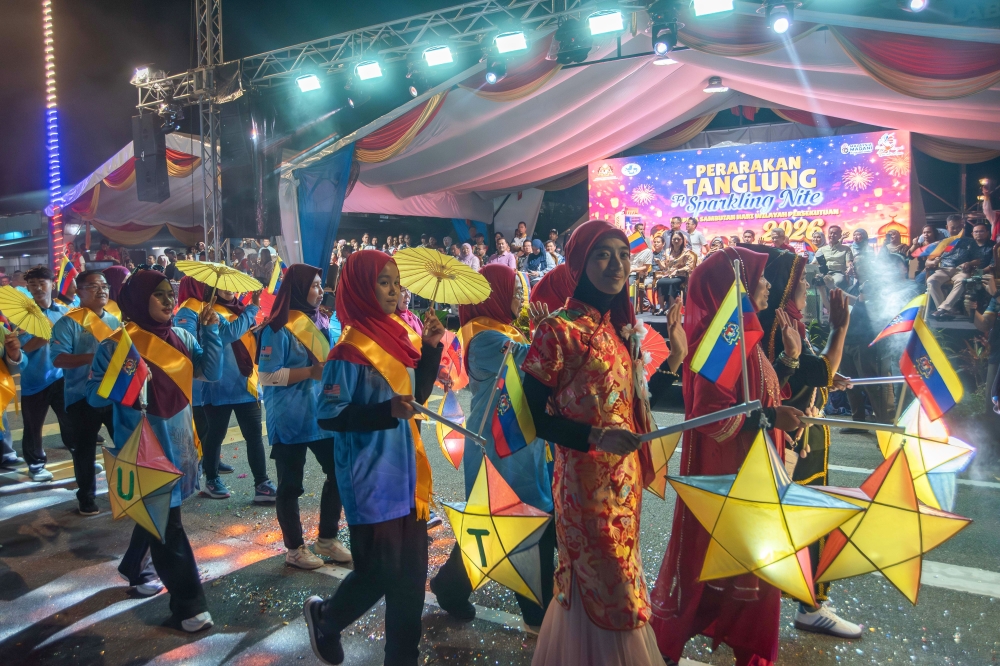Lanterns in every colour lit up the Labuan Sports Complex as thousands gathered for the parade’s long-awaited return. — Bernama pic