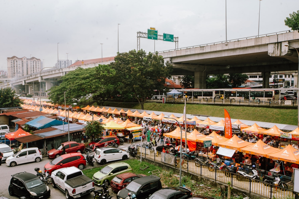 An aerial view showing rows of food stalls and a bustling crowd at the Ramadan bazaar in Wangsa Maju, Kuala Lumpur March 6, 2025. — Picture by Raymond Manuel