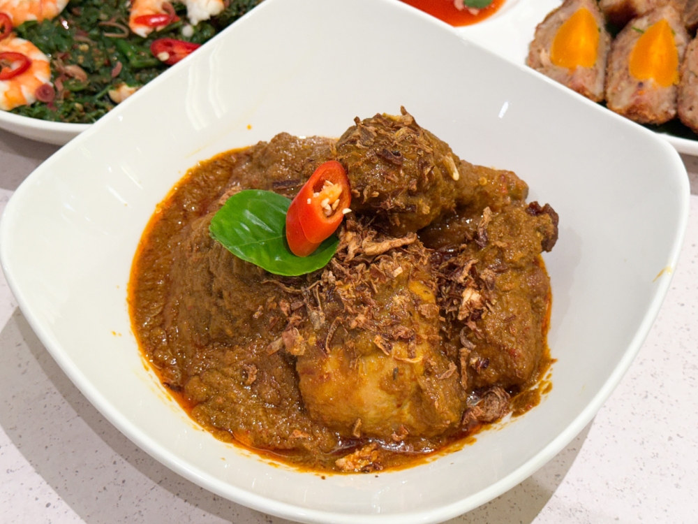 Kari Kapitan is a souped up chicken curry that is best eaten with rice. — Picture by Lee Khang Yi