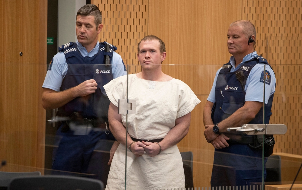 Brenton Tarrant (centre) was sentenced to life imprisonment for the Christchurch mosque massacre and launched an appeal to overturn his conviction on February 9, 2026. — AFP pic