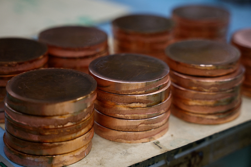 This file photo shows blocks of copper stacked during the production of bronze medals for the 2026 Milano-Cortina Winter Olympics at the Italian Mint in Rome, Italy, December 5, 2025. — Reuters pic
