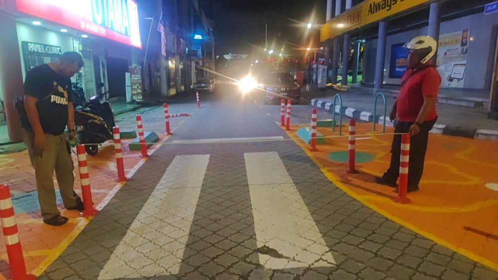 Measurements being taken for ‘Tiang’ 3. — Picture courtesy of TTDI Residents Association