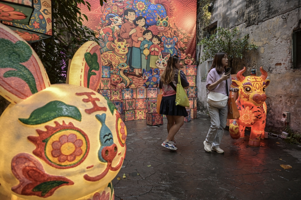 Visitors walk beneath colourful zodiac lanterns at the ‘Guardians of Legacy’ Chinese New Year art installation at Kwai Chai Hong, Kuala Lumpur, February 11, 2026. — Bernama pic