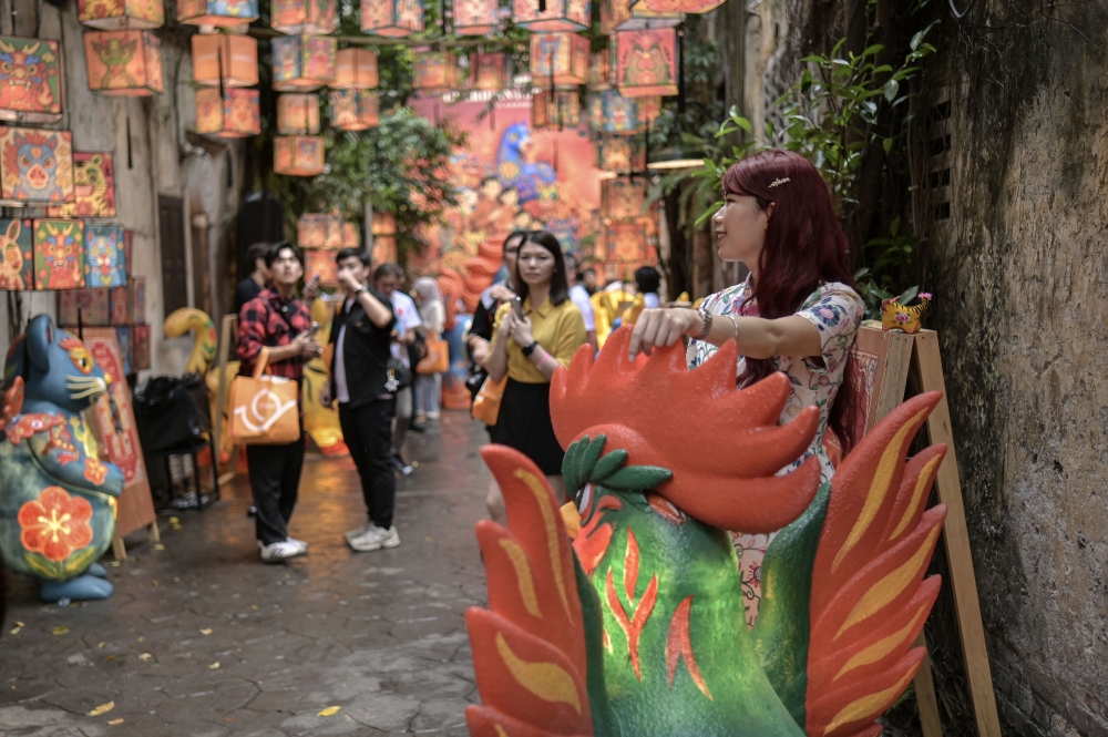 Visitors admire colourful zodiac lanterns at the ‘Guardians of Legacy’ Chinese New Year installation at Kwai Chai Hong, Kuala Lumpur, February 11, 2026. — Bernama pic