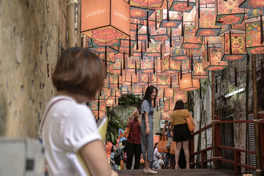 Colourful box-shaped lanterns featuring the 12 Chinese zodiac animals decorate the ‘Guardians of Legacy’ installation at Kwai Chai Hong, Kuala Lumpur, February 11, 2026. — Bernama pic