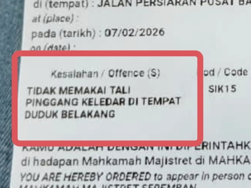 A close view of the February 7, 2026 traffic summons issued to a rear passenger in Nilai, Negeri Sembilan for failing to wear a rear seat belt. — Picture from Facebook via Daily Express