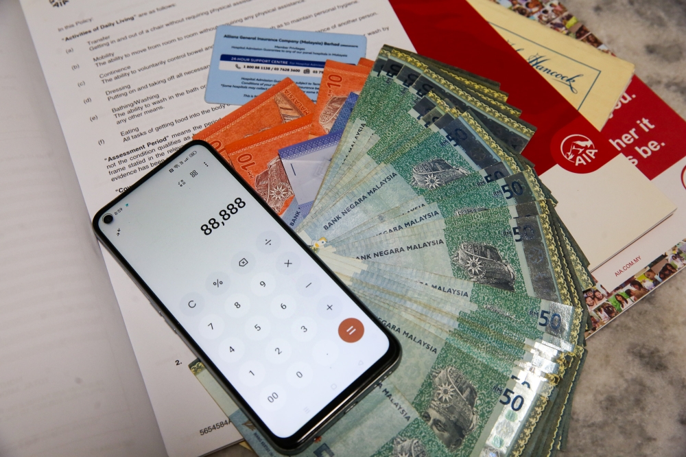 One big question when buying medical insurance is what you can afford. — Picture by Choo Choy May