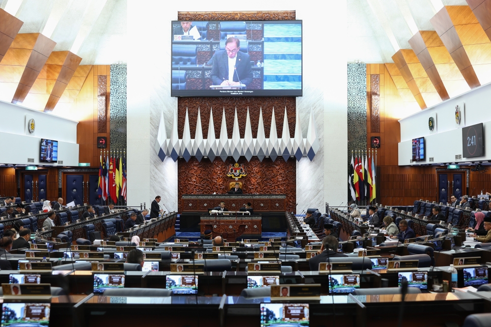 Prime Minister and Finance Minister Datuk Seri Anwar Ibrahim speaks during the Minister’s Question Time at the Dewan Rakyat in Kuala Lumpur on October 17, 2023. — Bernama pic