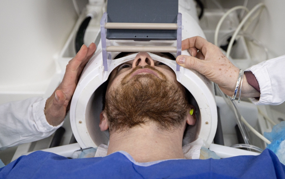A volunteer takes part in a magnetic resonance imaging (MRI) exam simulation on the Iseult Magneton 11.7 T MRI at the Neurospin facilities in the Paris-Saclay Alternative Energies and Atomic Energy Commission. — AFP pic