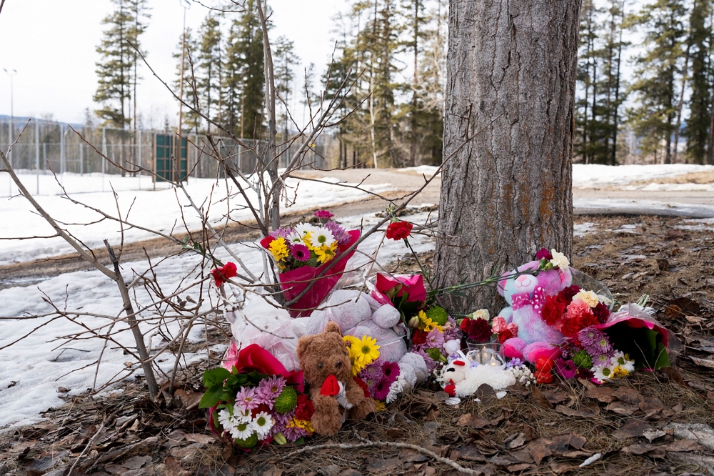 Flowers sit outside of Tumbler Ridge Secondary School where a shooting took place, leaving at least nine people dead in the small town of Tumbler Ridge, British Columbia, on February 11, 2026. — AFP pic 