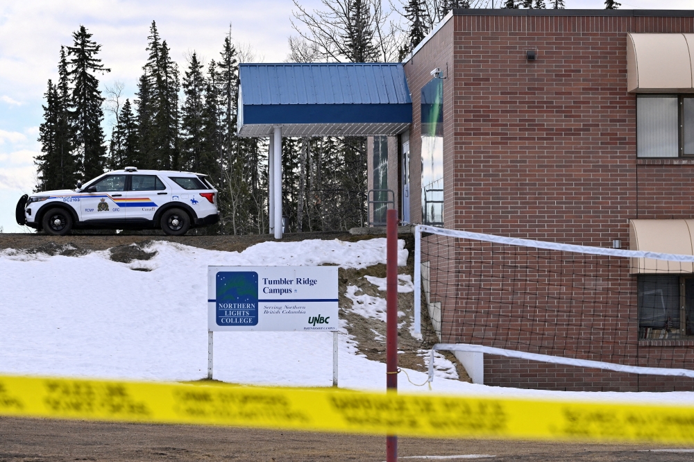A police vehicle is parked outside a high school, the site of a deadly mass shooting in the town of Tumbler Ridge, British Columbia, Canada February 11, 2026. — Reuters pic 