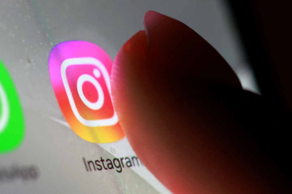 The Instagram app icon is seen on a smartphone in this illustration taken on October 27, 2025. — Reuters pic