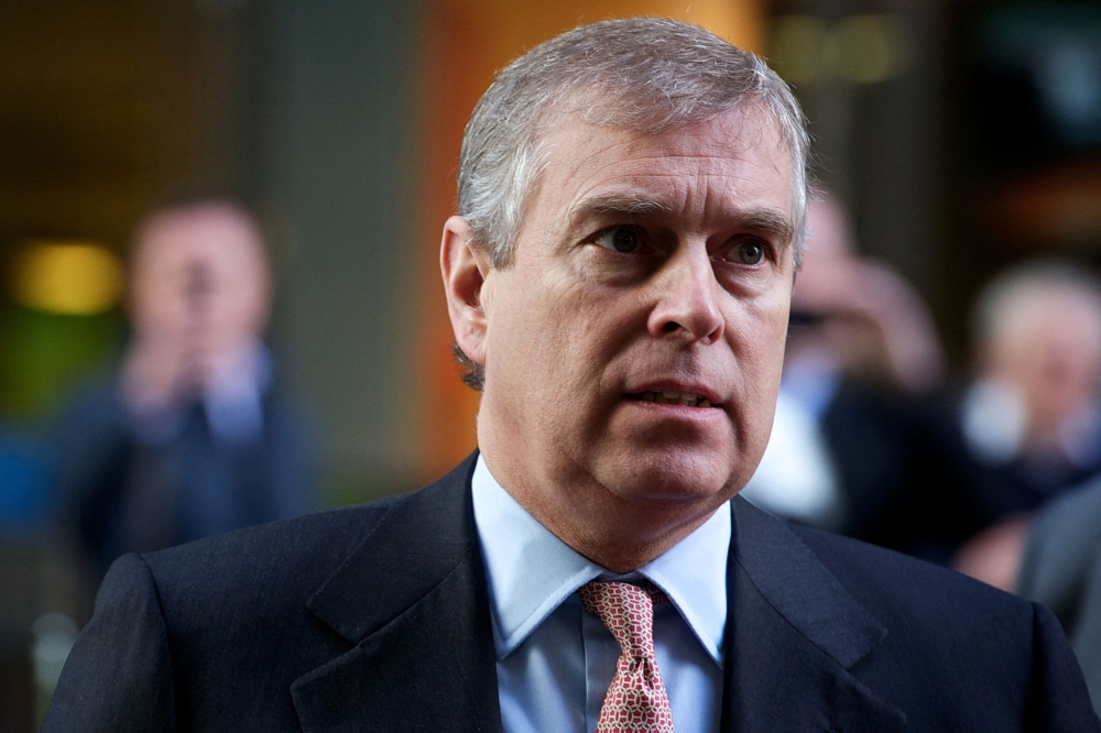 Britain's Prince Andrew arrives for a visit to the Cross Rail Head Office in Canary Wharf, east London on March 7, 2011. — AFP pic 
