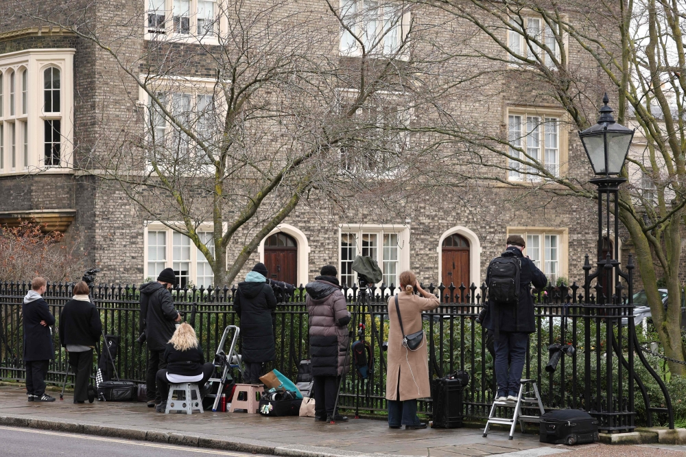 Members of the media gather outside the residence of Former UK ambassador to the United States, Peter Mandelson, in central London on February 8, 2026. — AFP pic 