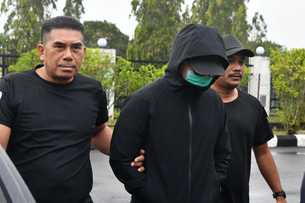 Ahmad Hilmi Zulkeflee is accused of secretly recording a woman bathing with his camera on September 13, 2025 at 6.30am, and storing obscene images and videos on his phone the following day at the Medical Officer Trainee Hostel. — Bernama pic
