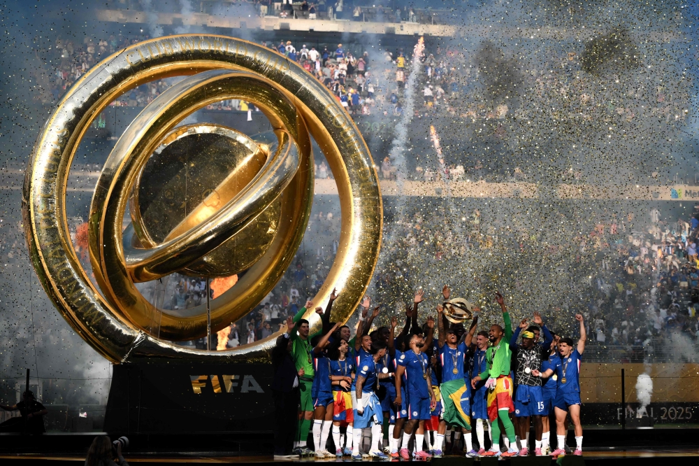 Joao Pedro of Chelsea FC lifts the Fifa Club World Cup trophy after his team’s victory following Fifa Club World Cup 2025 Final with Paris Saint-Germain at MetLife Stadium in East Rutherford, New Jersey, July 13, 2025. — AFP pic