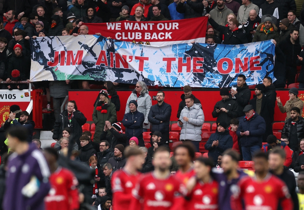 Manchester United fans display a banner in protest against co-owner Jim Ratcliffe after the Premier League match against Tottenham Hotspur at Old Trafford, Manchester February 7, 2026. — Reuters pic 