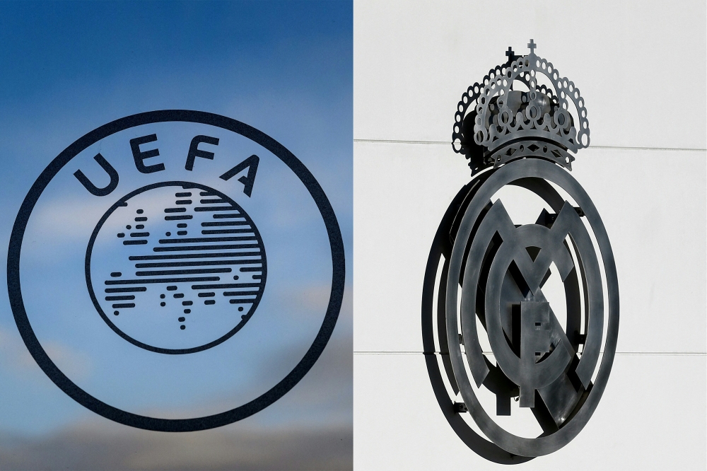 This combination of files pictures created on February 11, 2026 shows a logo of the Uefa the European football governing body on December 15, 2014 at the Uefa headquarters in Nyon and Real Madrid logo at the Spanish club’s training facilities of Valdebebas in Madrid on March 20, 2019. — AFP pic