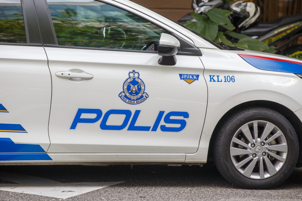 Police detained the owner of the Facebook account Cikgu Chandra yesterday over posts allegedly capable of disrupting public order. — Picture by Raymond Manuel