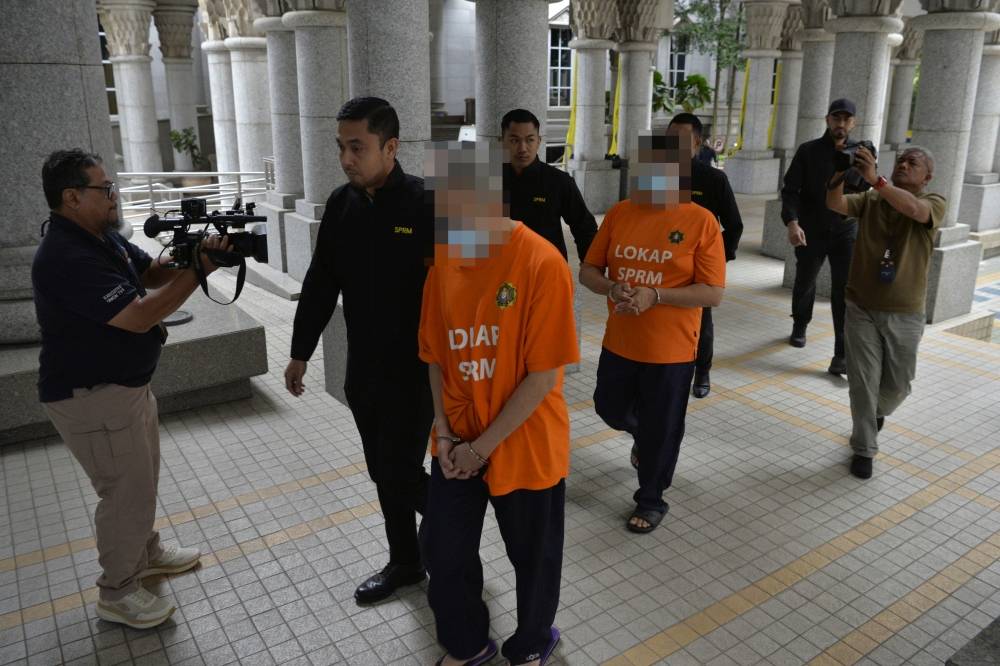 Two senior government officials were remanded for five days until February 16 over alleged RM900,000 fund misappropriation. — Bernama pic