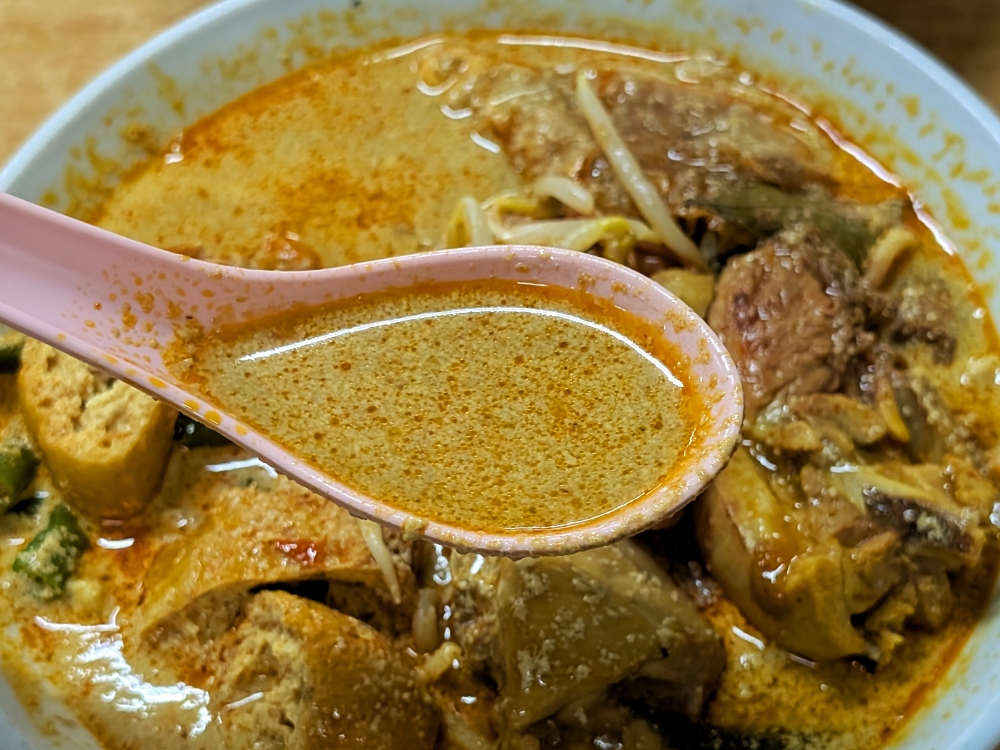 The curry is especially ‘lemak’, which shows up in the colour too. — Picture by Ethan Lau