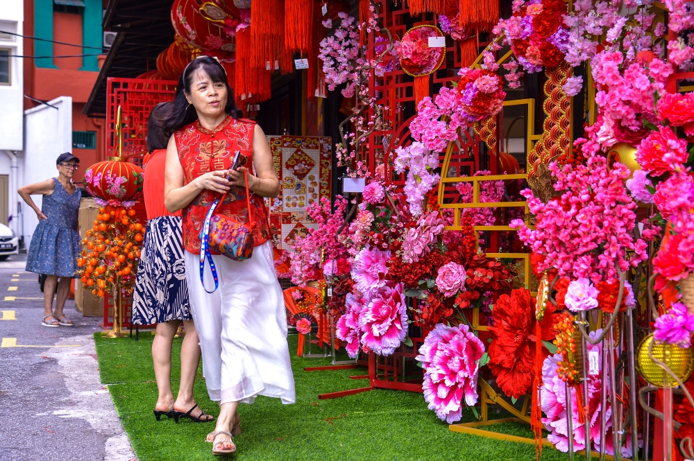 Shoppers are busy selecting festive decorations in preparation for the upcoming Chinese New Year during a visit to a decorative items shop at Petaling Street, Kuala Lumpur, February 13, 2026. — Bernama pic 