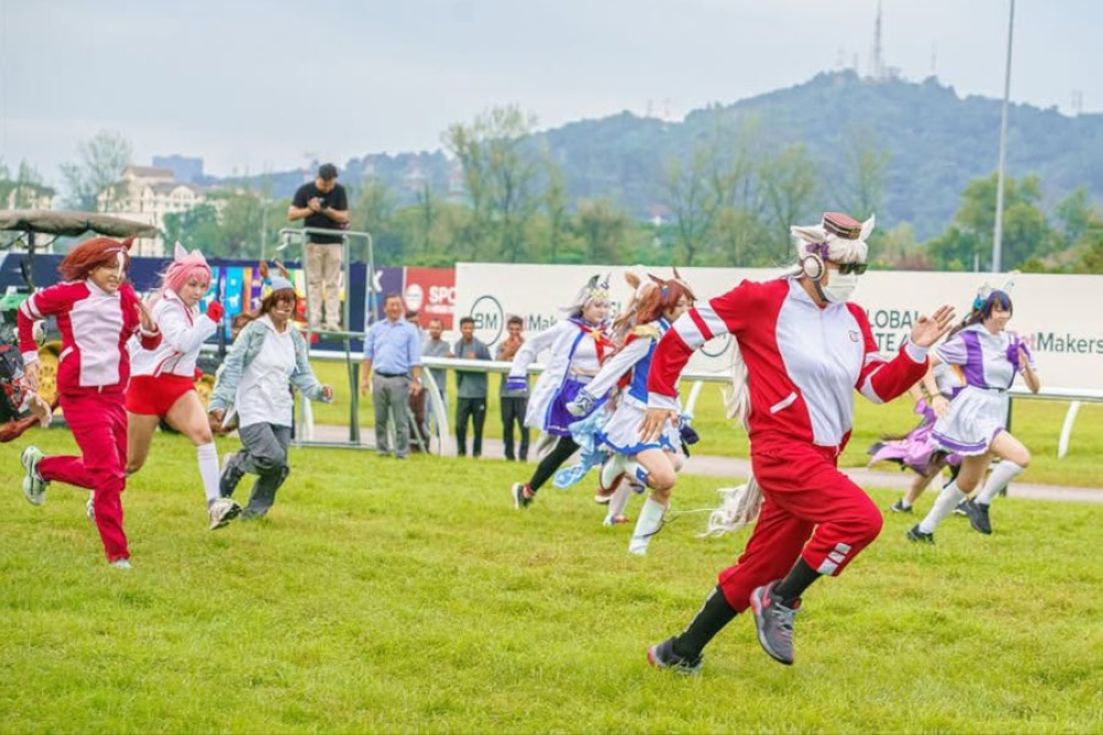 In a previous collaboration last October, the STC let local Umamusume cosplayers take to the turf, giving them the rare chance to race against one another. — Picture courtesy of Umamusume Circle MY