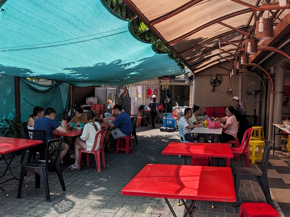 A few tables are set out by the patio, and a few more on the front porch. — Picture by Ethan Lau