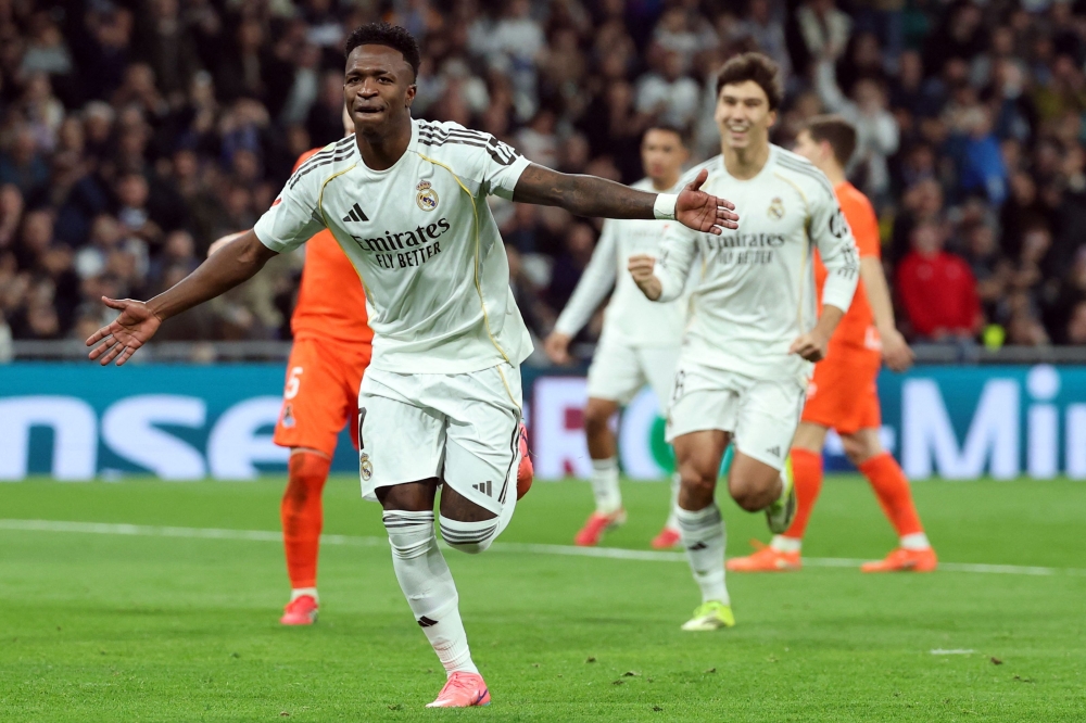 Real Madrid's Brazilian sensation Vinicius Junior celebrates after scoring his team's fourth goal. — AFP pic