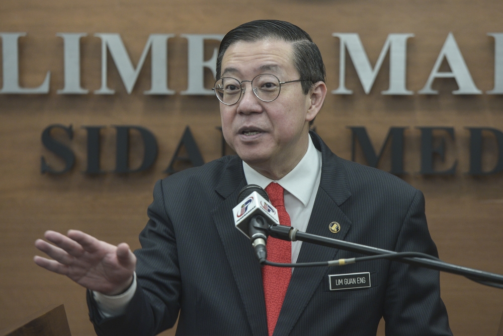 Lim Guan Eng speaks to the media during a press conference at Parliament in Kuala Lumpur on October 11, 2019. — Picture by Shafwan Zaidon