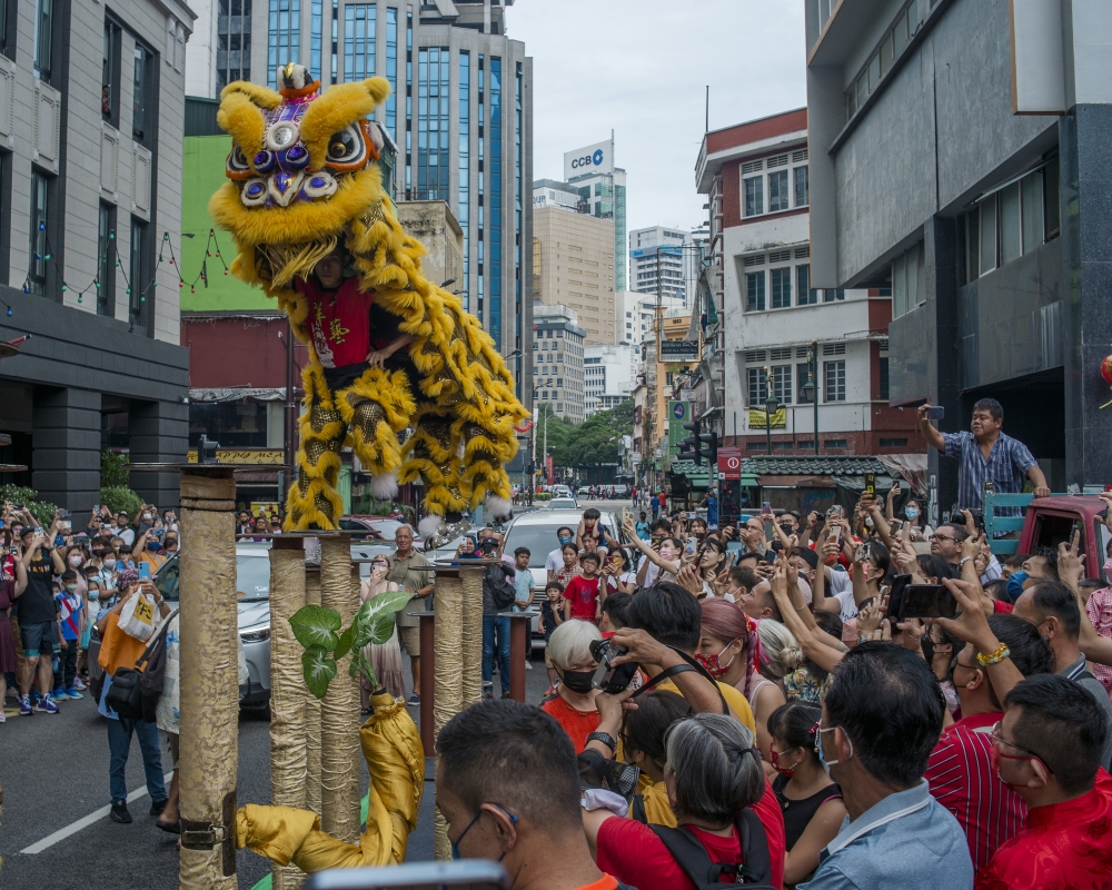 The lion dance carries blessings of luck, prosperity and unity. Seen here is a vibrant performance during Chinese New Year celebrations at Petaling Street in Kuala Lumpur on January 23, 2023. — Picture by Shafwan Zaidon